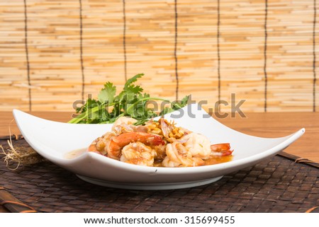 fried garlic shrimp pepper asia food wooden background