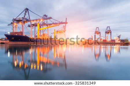 Containers loading Shipping by crane at morning or Trade Port