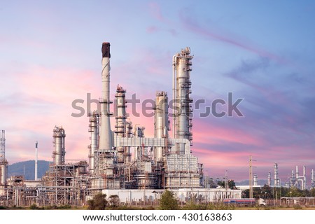 Oil refinery industry plant twilight at sunset
