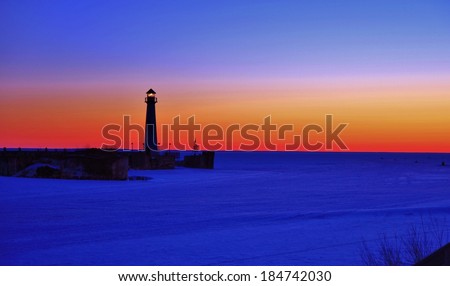 St. Ignace Sunrise. Sunrise at the Chief Wawatam Lighthouse in St Ignace, Michigan.