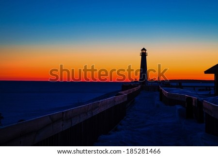 Winter Lighthouse Sunrise. The Wawatam Lighthouse in at dawn. St. Ignace, Michigan.
