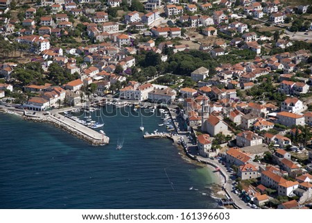 Sutivan, settlement on northwest side of island Brac in Croatia, view on port and coastline