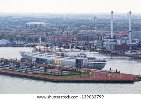 ROTTERDAM,NETHERLANDS - SEPTEMBER 28: The tourist liner in port, September 28, 2012, Rotterdam, Netherlands. The port area in Rotterdam makes 105 square km, at length it is extended on 40 km