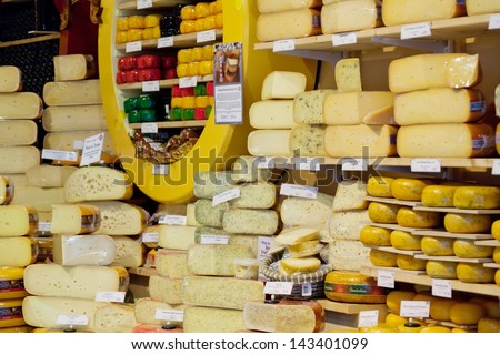 DELFT,NETHERLANDS - SEPTEMBER 27: Show-window with cheese in shop, Delft, Holland, September 27,2012. The volume of export of Dutch cheese makes 7 billion euro a year