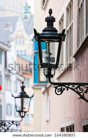 Decorative lamp on a house wall, Zurich, Switzerland