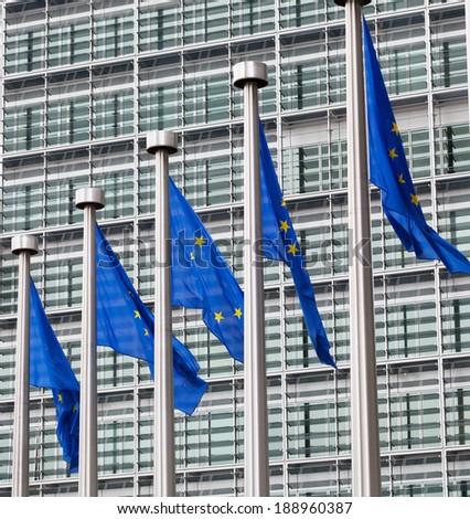 European Union flags against the European Parliament building