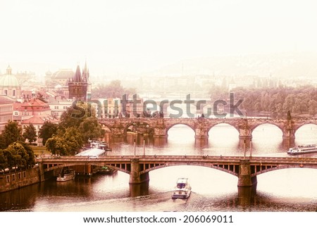 Prague, view of the Vltava River and bridges in a morning fog