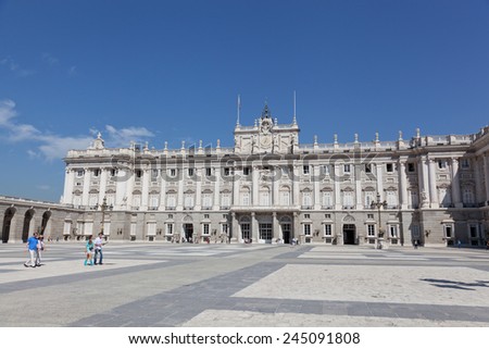 MADRID, SPAIN - SEPTEMBER 24,2013: Tourists near  Royal palace. Royal palace in Madrid (Palacio Real de Madrid), differently East palace (Palacio de Oriente) - official residence of kings of Spain.