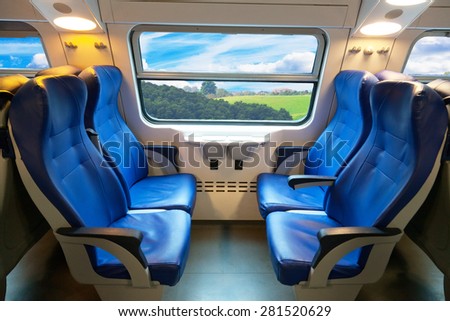 car of the train of the long-distance message with a beautiful view from the window