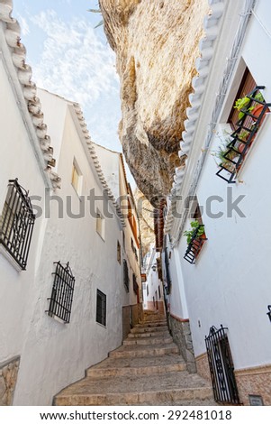 Wide view of street between the rocks in Setenil de las Bodegas, Cadiz ,Spain