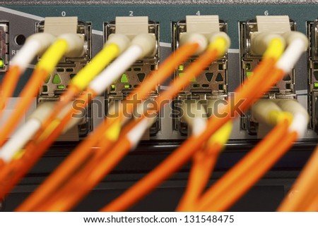 Fiber link switch close-up in datacenter.