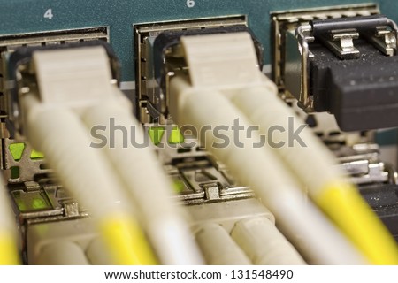 Fiber link switch close-up in datacenter.