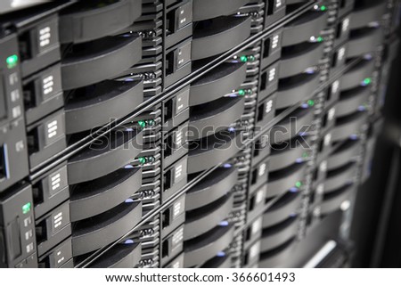 Close up of hard drives in large SAN storage