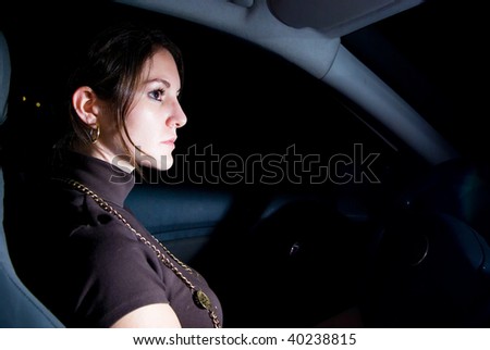 Stopped car with beautiful woman inside