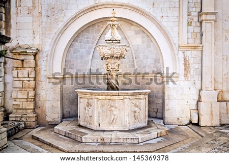 Old renaissance fountain inside old town Dubrovnik. Onofrije Small Fountain.