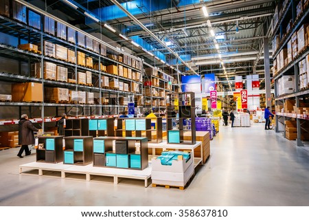 MALMO, SWEDEN - JANUARY 2, 2015: Interior of large IKEA storehouse with a wide range of products in Malmo, Sweden. Ikea was founded in Sweden in 1943, Ikea is the world's largest furniture retailer.