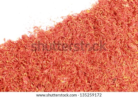 Saffron used in traditional chinese herbal medicine isolated over white background. Hong Hua. Flos carthami tinctori.