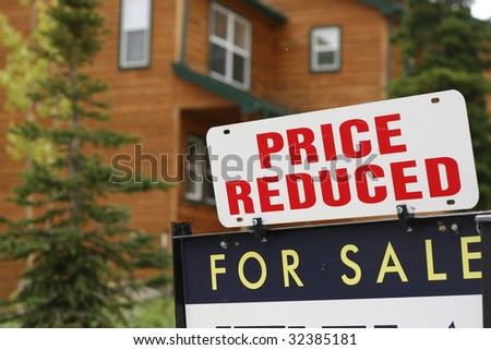Home For Sale Price Reduced Sign
