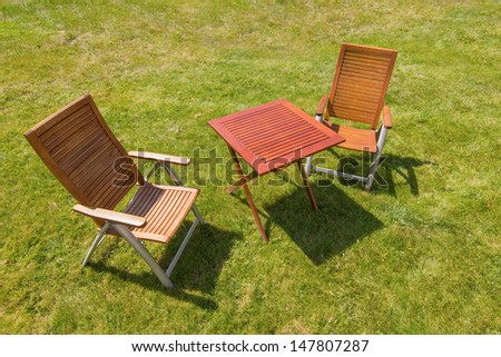 Chairs and table in the garden in a luxury spa in Poland