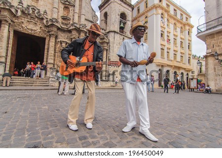 HAVANA - FEBRUARY 2: Two men play and sing February 2, 2013 in Havana, Cuba. Cuban music is an attraction for the over 2 million tourists who go to Cuba each year.