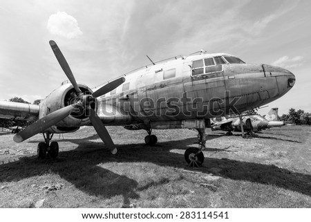 A black and white photo of an old plane