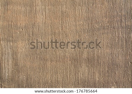 Pattern straight vertical grooves in stone - Background image.