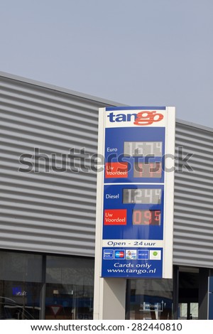 HOORN , HOLLAND - APRIL 10, 2015: Tango gas station prices Oil based fuel prices have recently dropped,  on april  10, 2014 in Hoorn