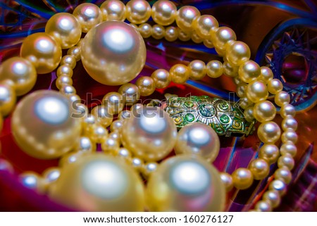pearl necklace on lead glass