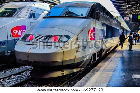 PARIS, FRANCE - JUNE 8: SNCF TGV trains on Northern train station, Gare du Nord, on June 8, 2009 in Paris, France. A TGV test train set the record for the fastest wheeled train on 3 April 2007.