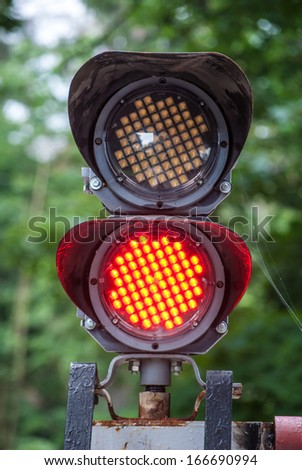 view on a signal post and railroad, macro