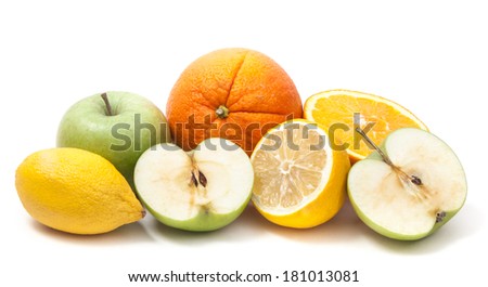 big orange, apple, and lemon with slices isolated on white