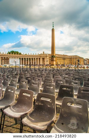 VATICAN CITY, VATICAN - AUGUST 26, 2014: Rows of seats on Saint Peter's Square in Vatican City, Vatican on August 26. The square is prepared for the annual speech of the Pope.