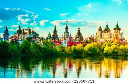 Beautiful landscape with Izmaylovo Kremlin behind river and lush greenery, Moscow, Russia