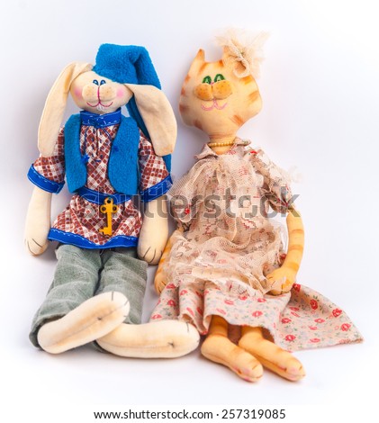 Rural textile dolls couple. Anthropomorphic animals. Bunny and cat.