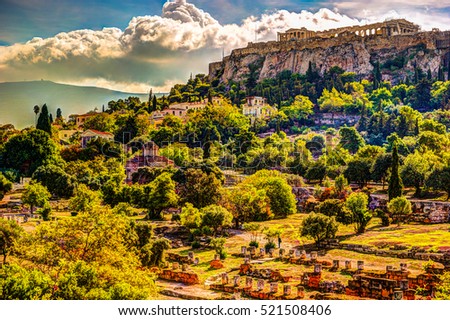 View on Acropolis from ancient agora, Athens, Greece. Beautiful landscape photography at dawn with ruins of classical greek architecture.