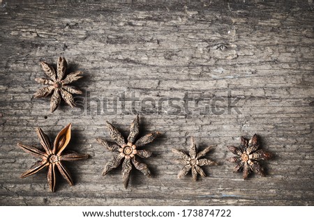 star anise on aged wood