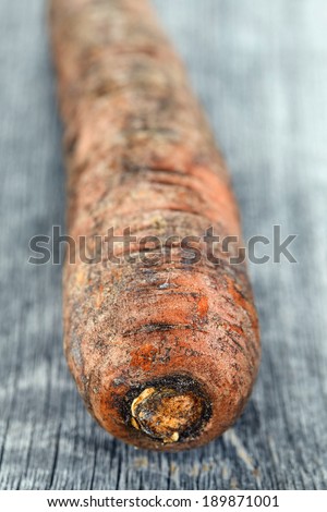 carrot on wooden table, macro