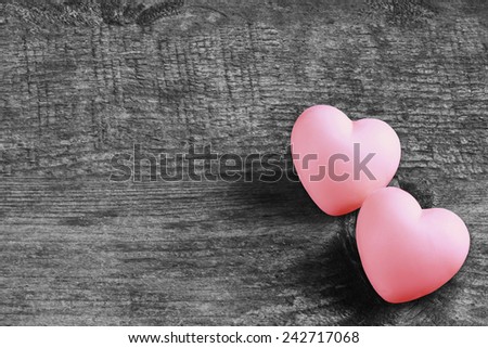 Couple of love pink hearts on wooden dark background - valentines - mothers day - fathers day - wedding invitation - card - space for text