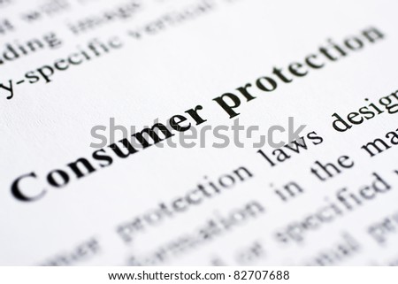 The words Consumer protection shot with artistic selective focus.