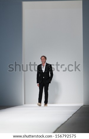 NEW YORK, NY - SEPTEMBER 11: Oskar Metsavaht take a bow at the Osklen Spring Summer 2014 fashion show during Mercedes-Benz Fashion Week on September 11, 2013 in New York City, USA.