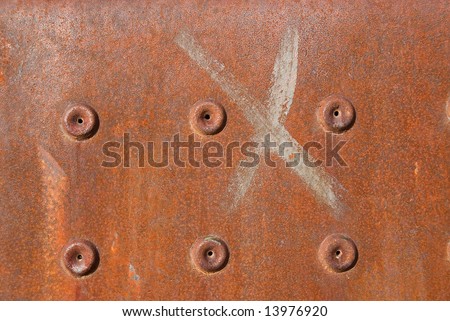 Rusty Surface with a painted cross