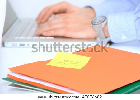 Businessman\'s desktop with folders