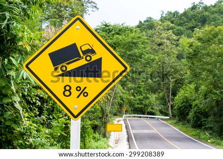 Asphalt roads in the forest and Road signs