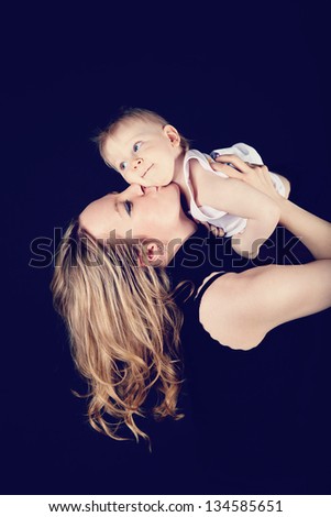 mother kiss her son