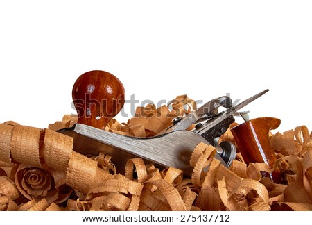 Planer for wood. Plane lies in the wood chips. Plane isolated on a white background