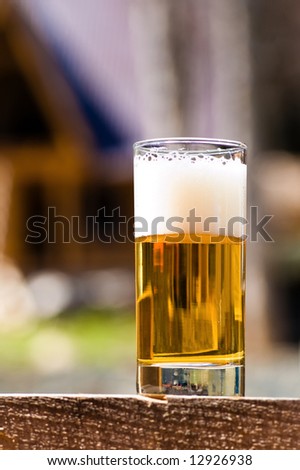 beer goblet with beer outdoors