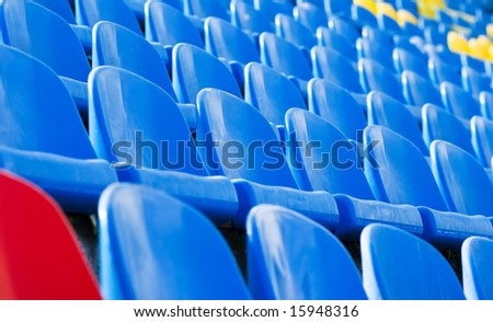 empty sport stadium chairs background