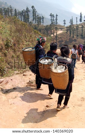 SAPA-CIRCA MARCH 2009: Unidentified Hill Tribe Women during a tourist trek circa March, 2009 in Sapa,Vietnam