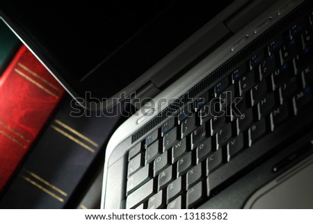 Laptop computer and book
