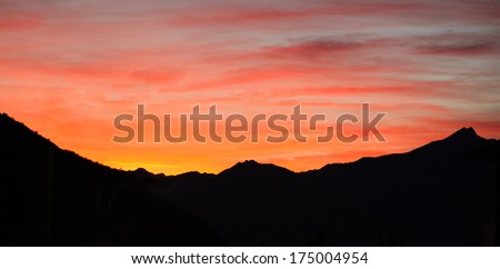 Silhouette of the Italy Alps at sunset.